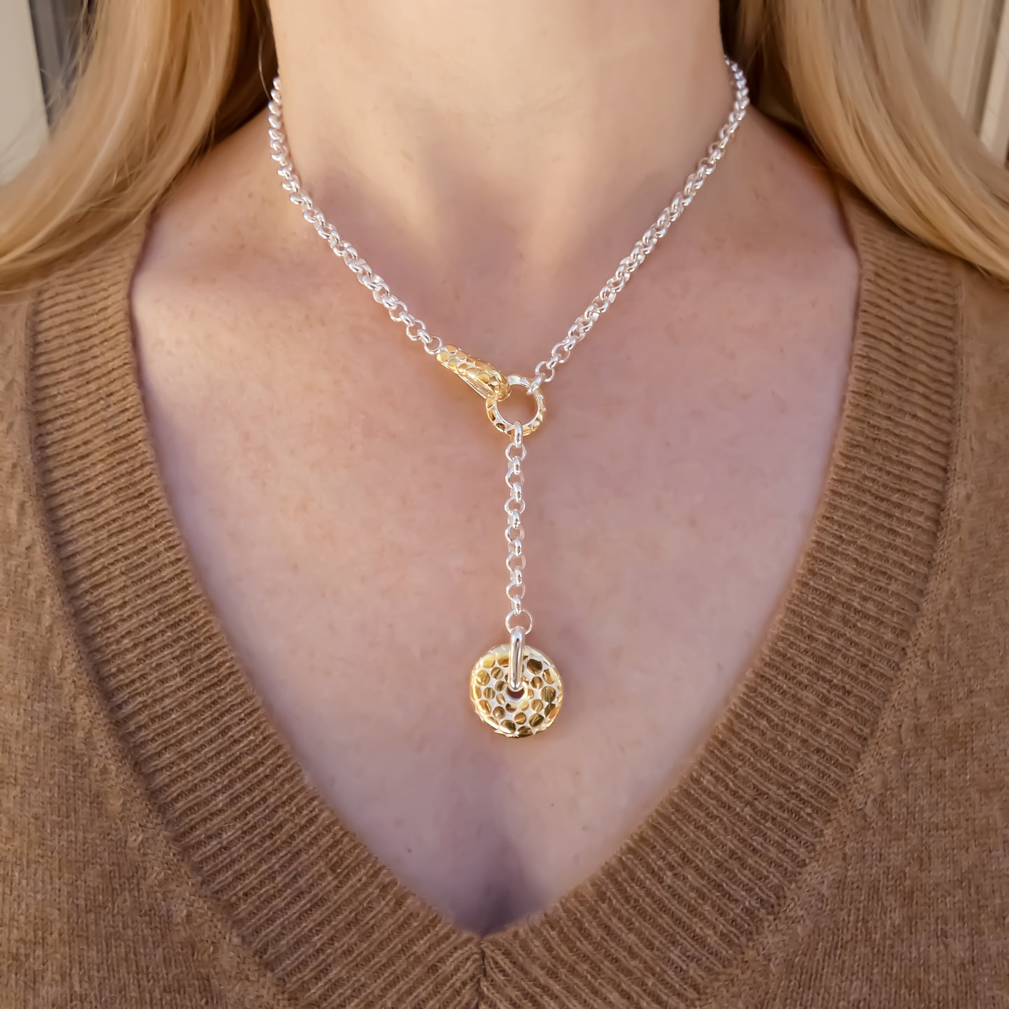 Sterling silver and gold rolo necklace.