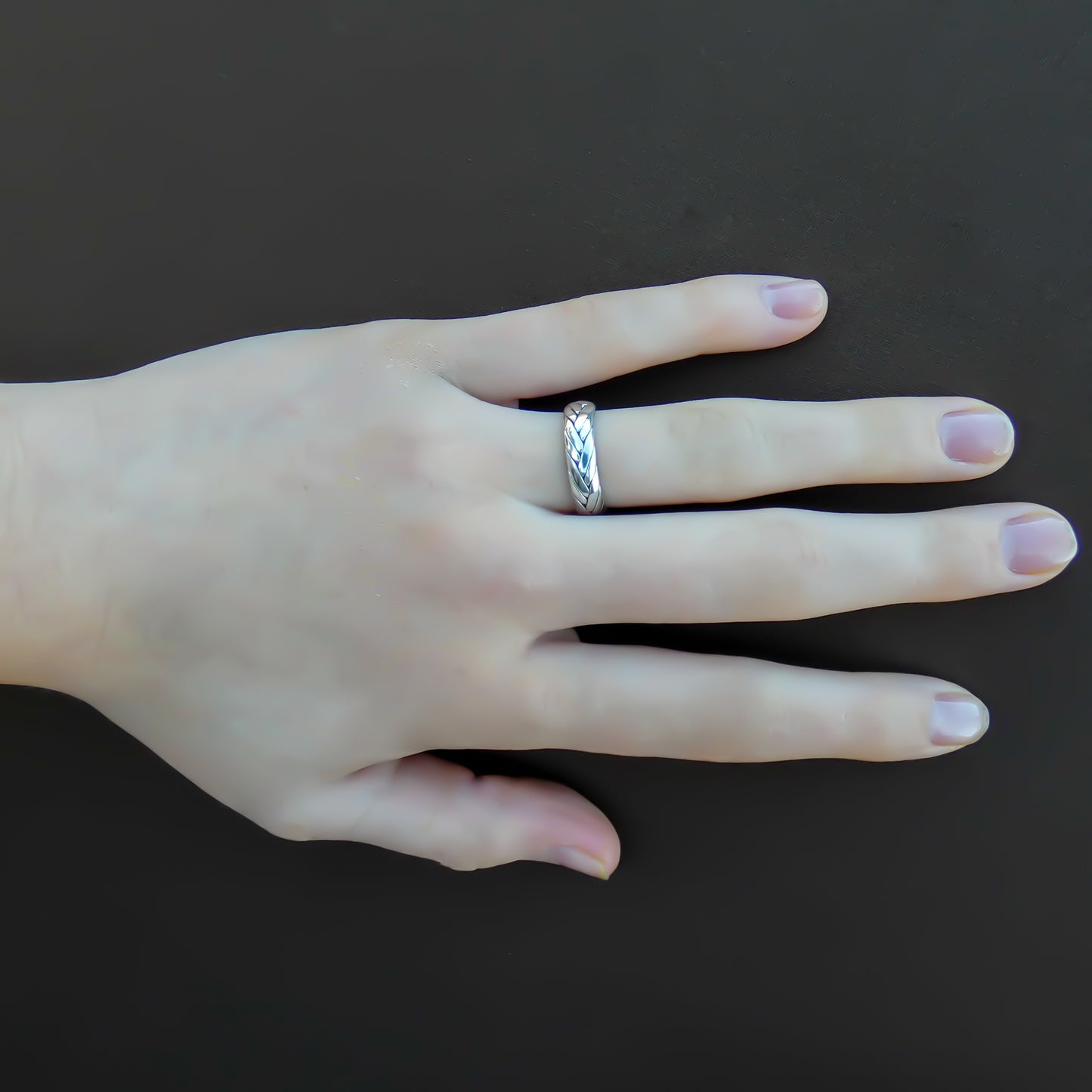 Sterling silver woven band ring.