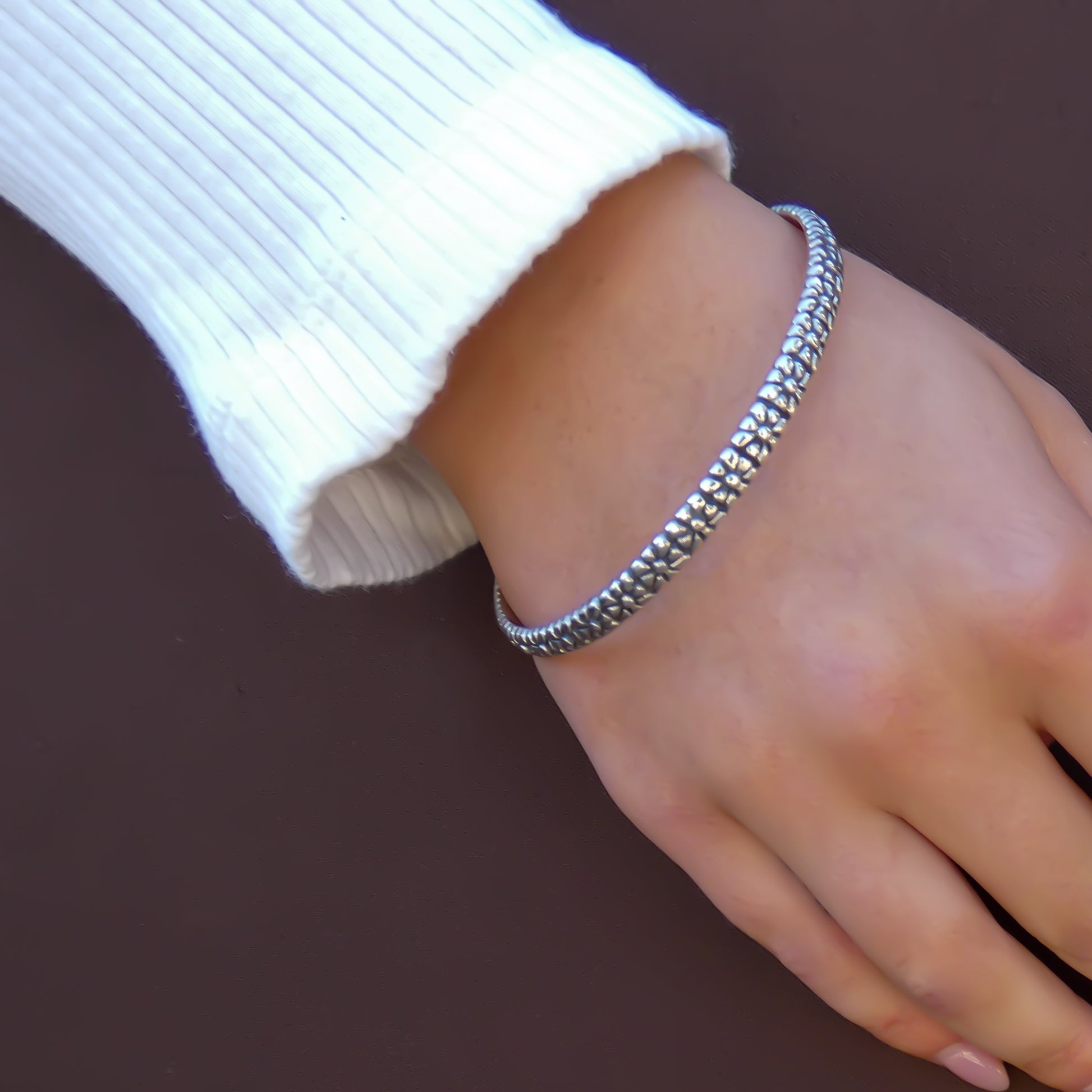 Sterling silver floral pendant.