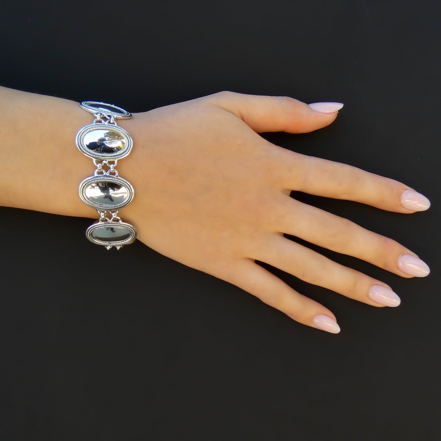 Sterling silver link bracelet.