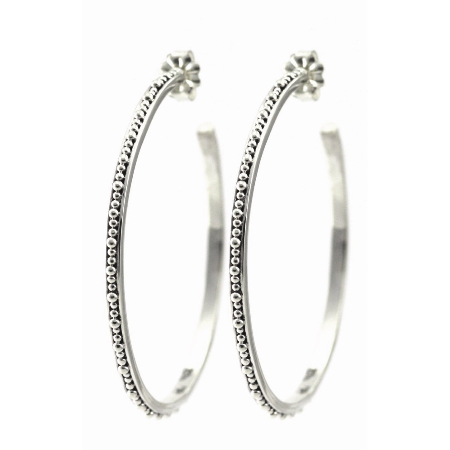 Sterling silver large beaded hoops.