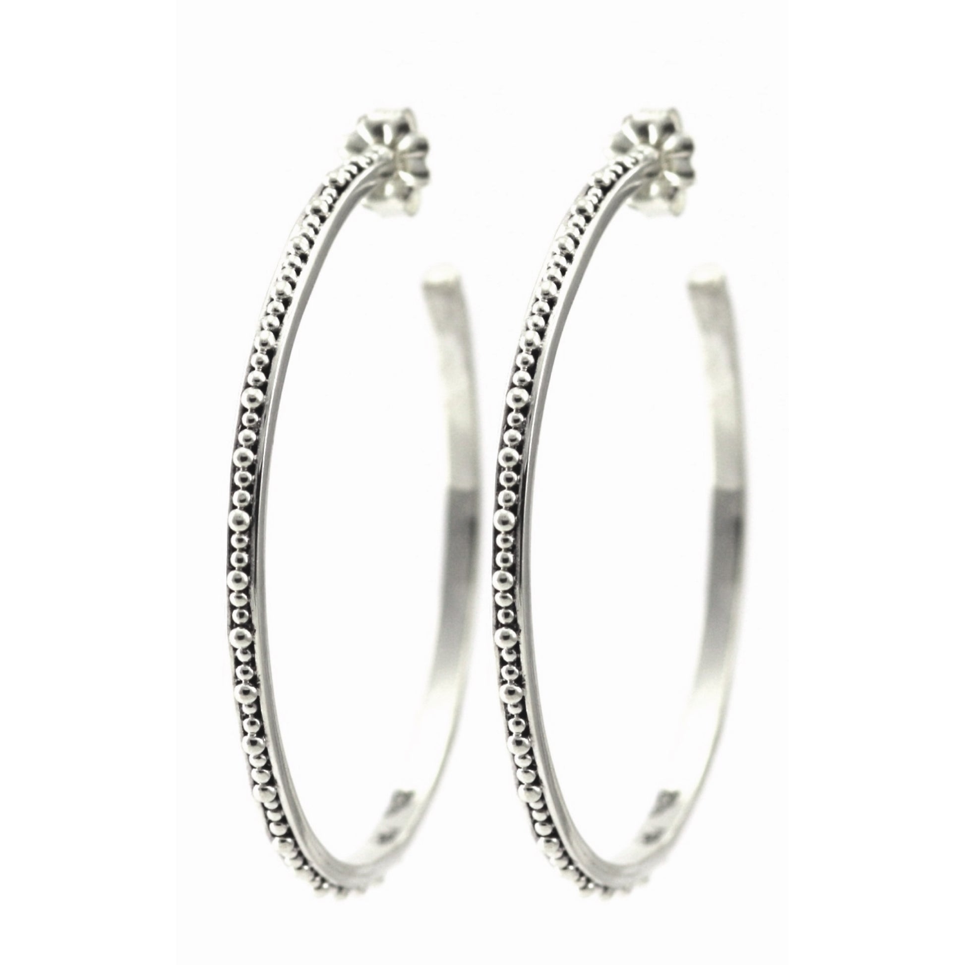 Sterling silver large beaded hoops.