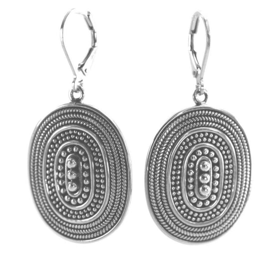 Sterling silver beaded oval earrings.