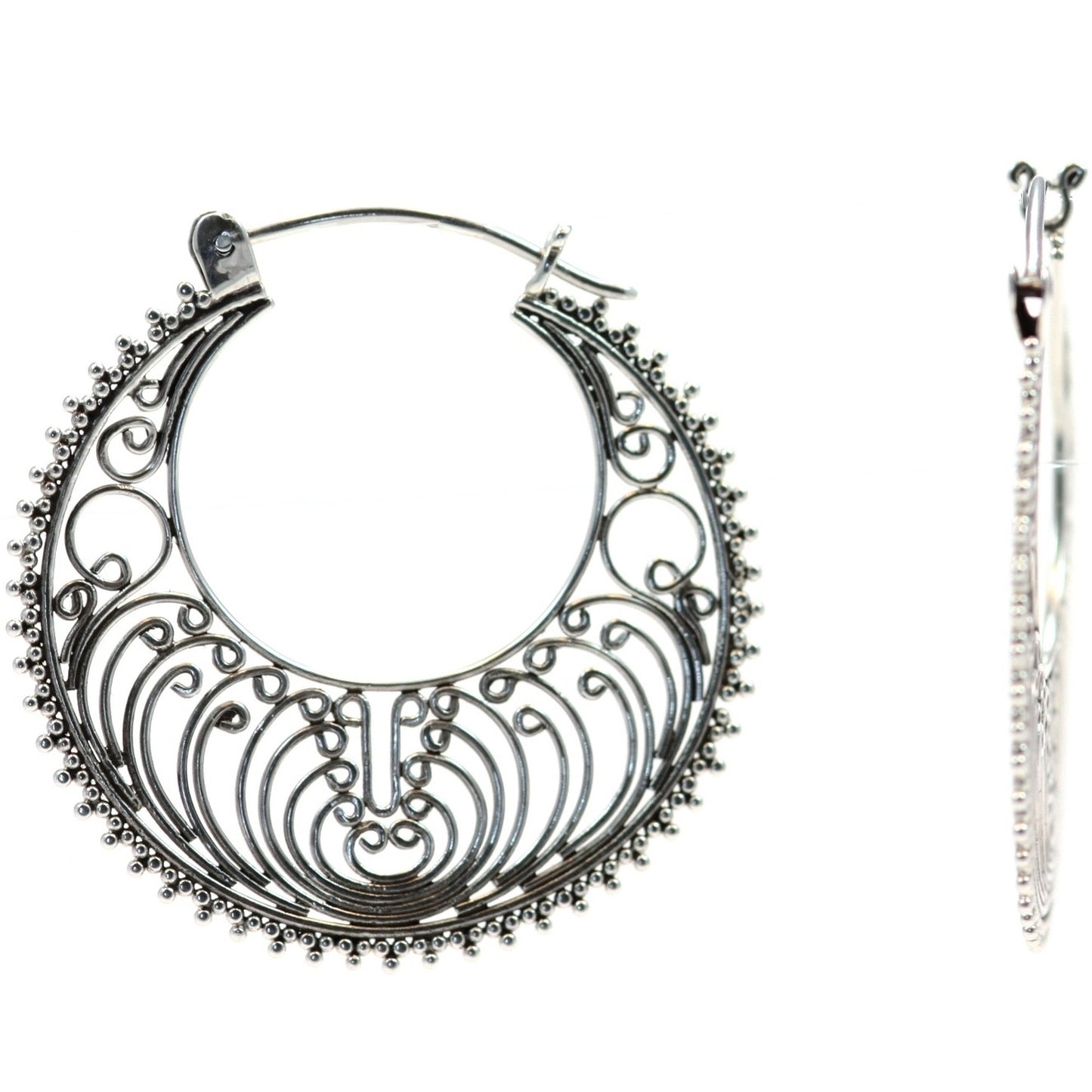 Sterling silver filigree wire earrings.