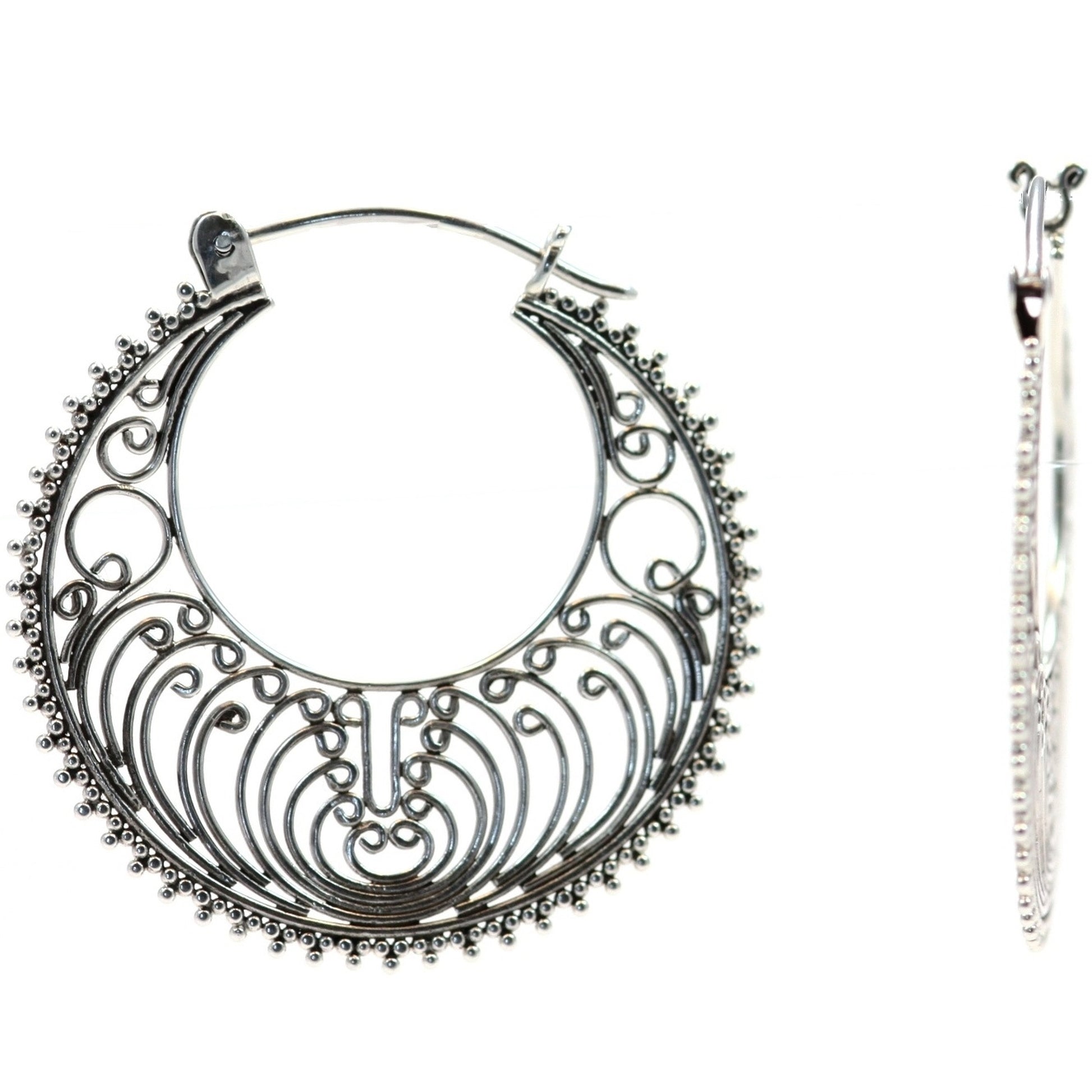 Sterling silver filigree wire earrings.