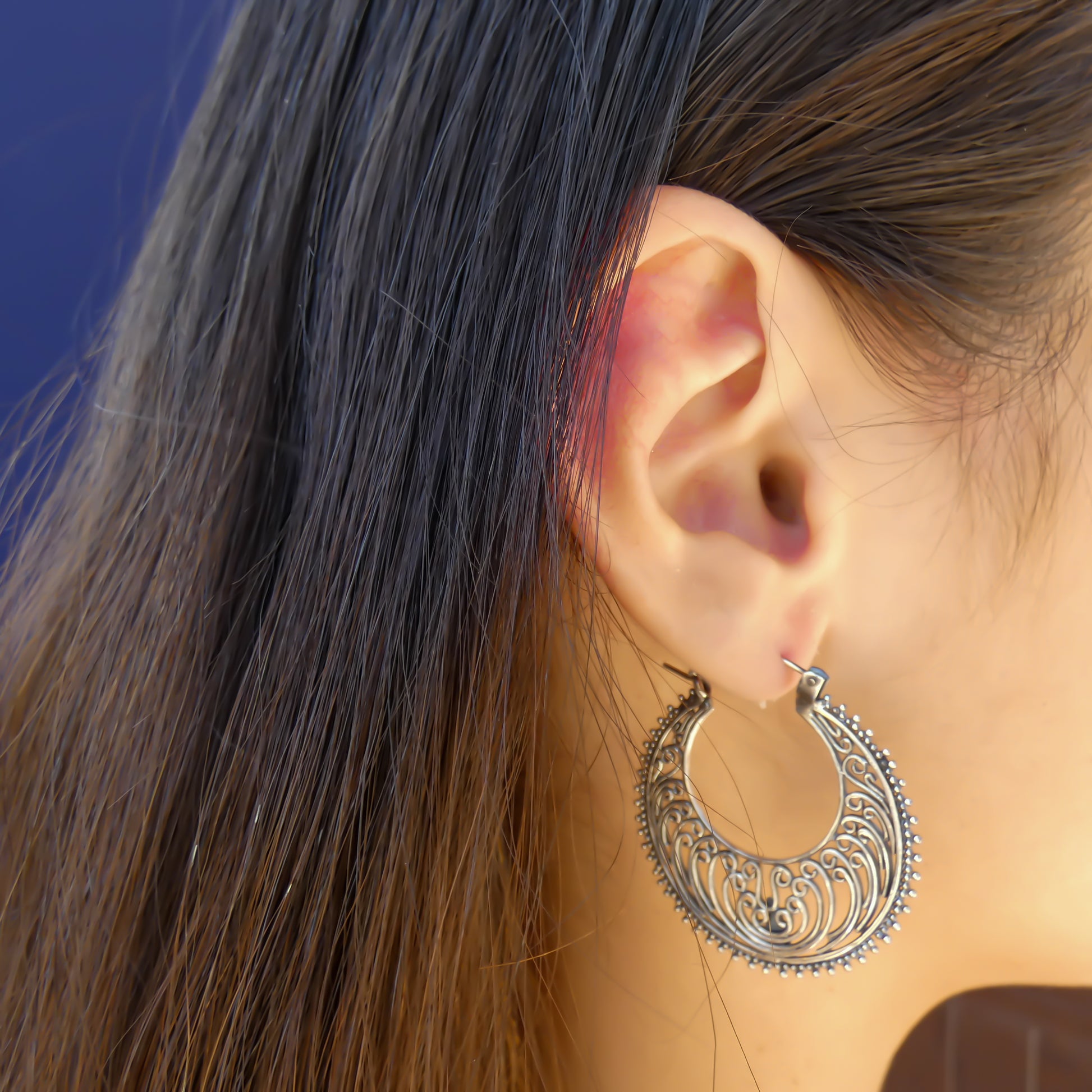 Sterling silver filigree wire earrings.