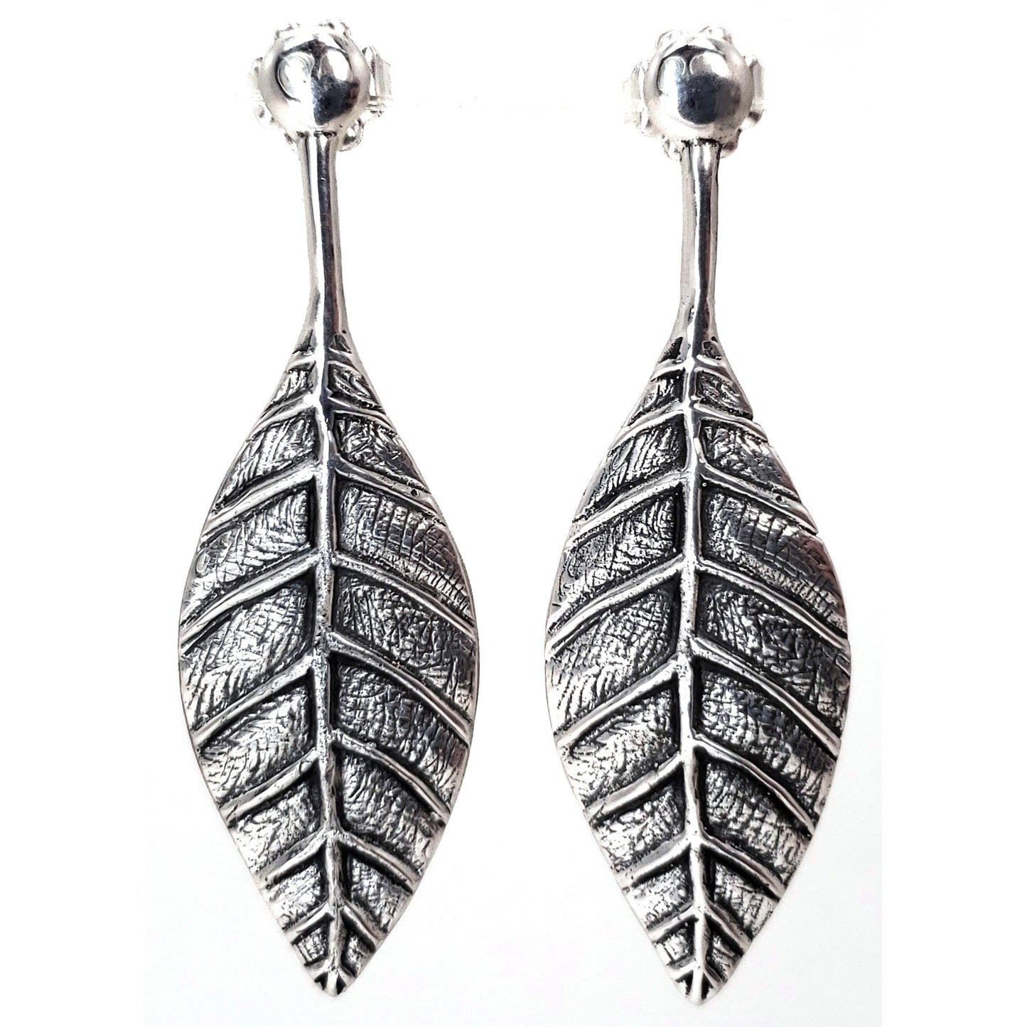 Sterling silver leaf earrings.