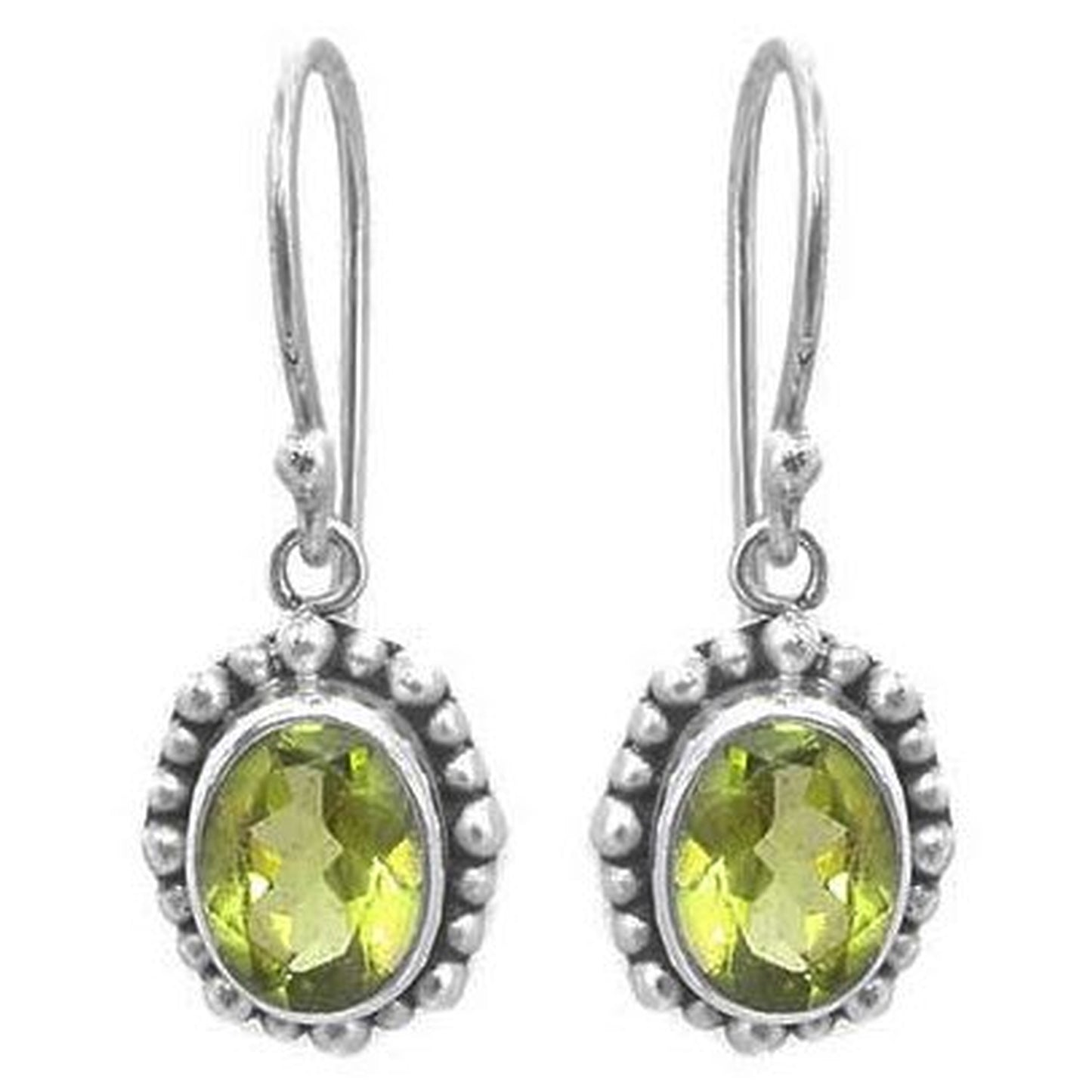 Silver earrings with oval peridot gemstones.
