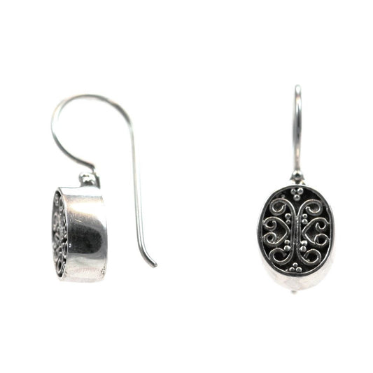 Sterling silver wire dangle oval earrings.