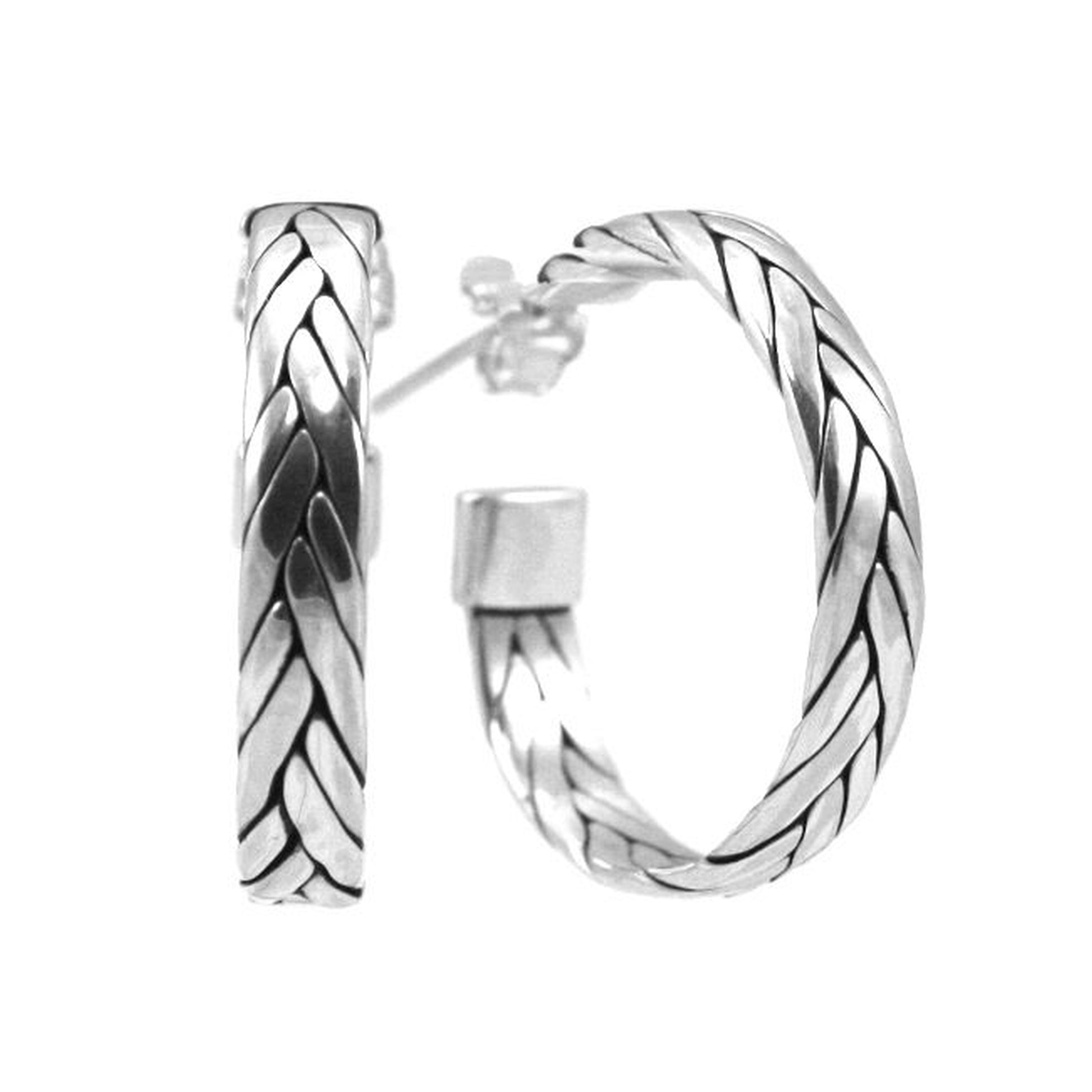 Woven silver three-quarter hoop post earrings.