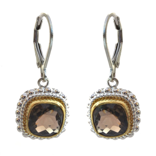 Silver and gold earrings with smoky topaz stones.