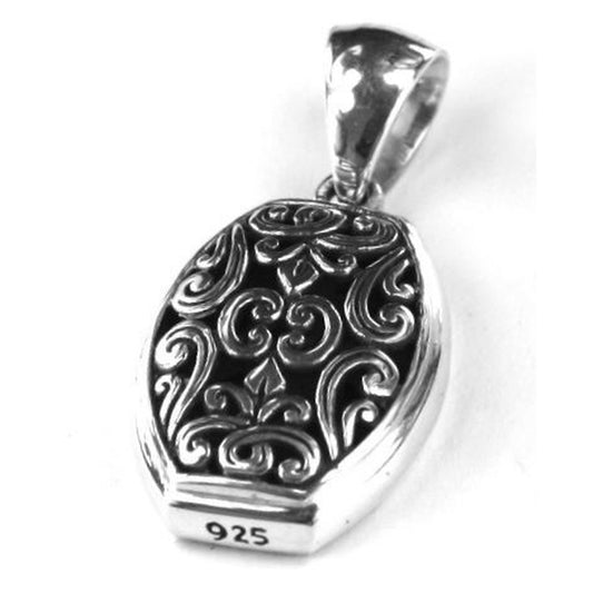 Sterling silver floral carved pendant.