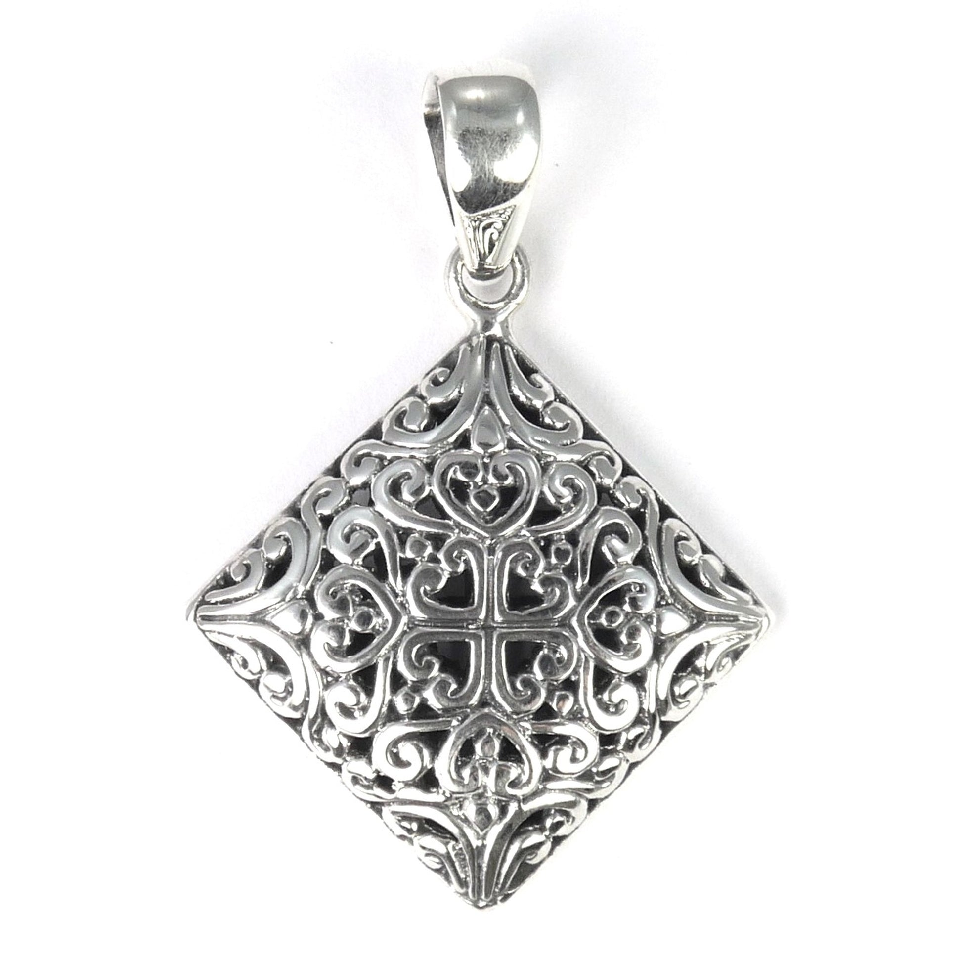 Sterling silver filigree pendant.