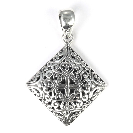 Sterling silver filigree pendant.