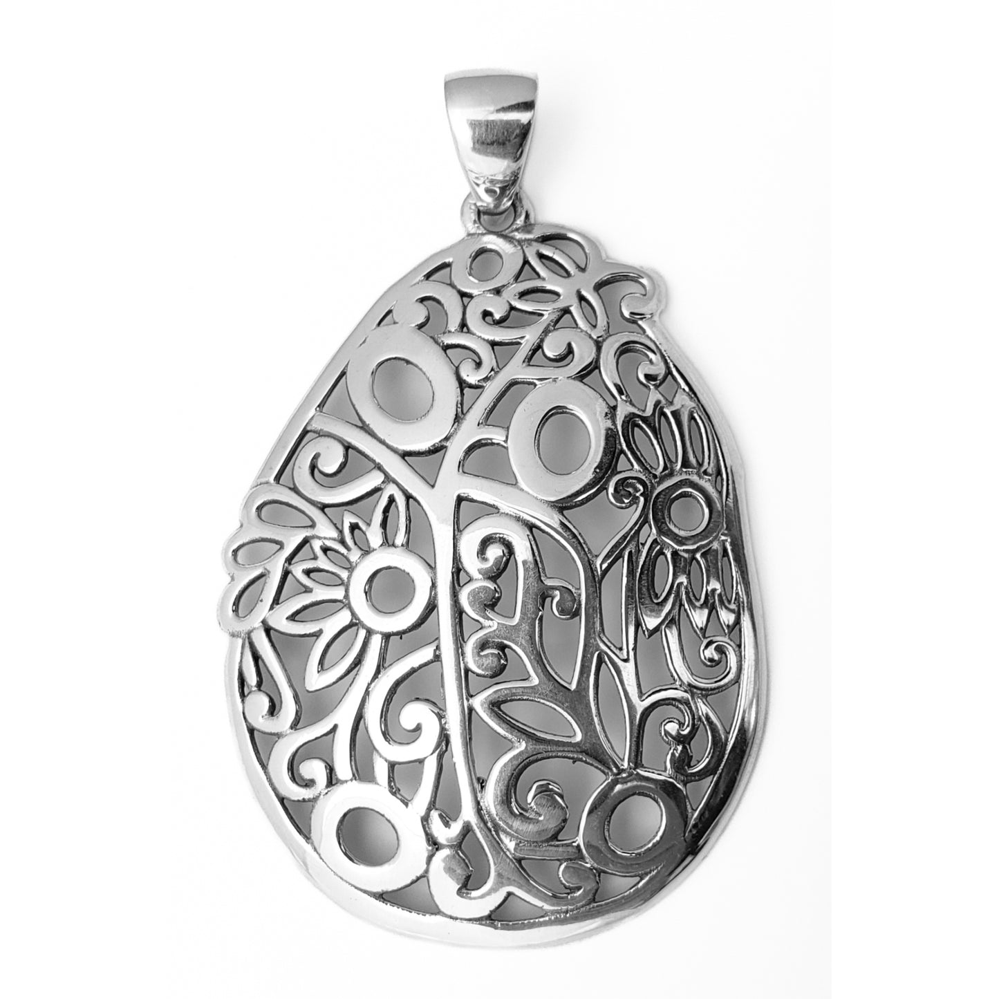 Sterling silver floral pendant.