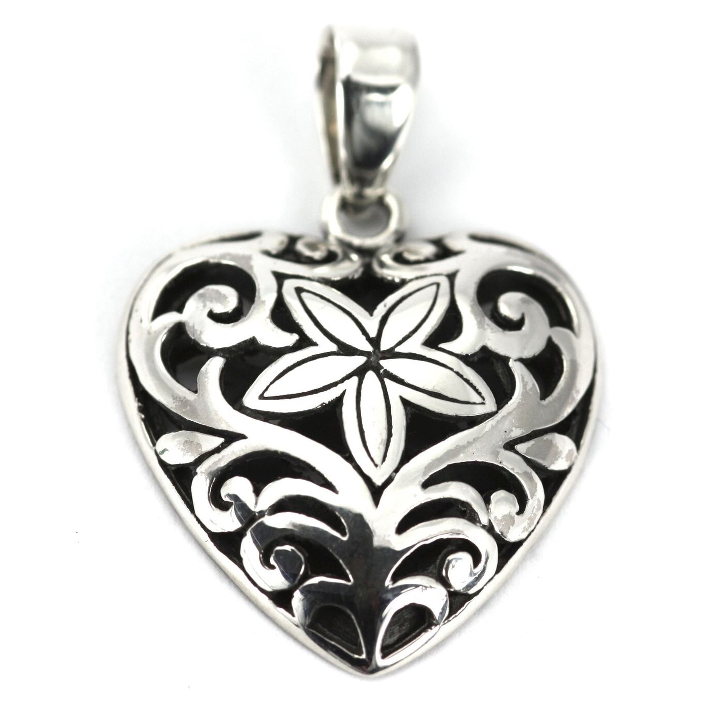 Sterling silver floral heart pendant.
