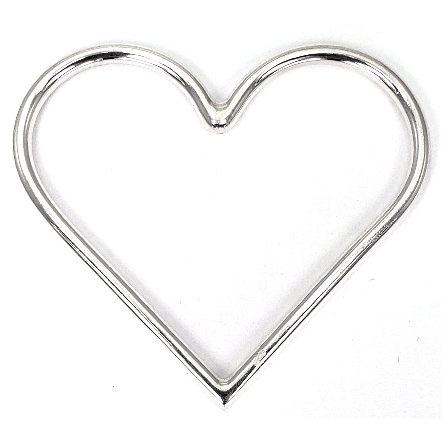 Sterling silver heart charm.