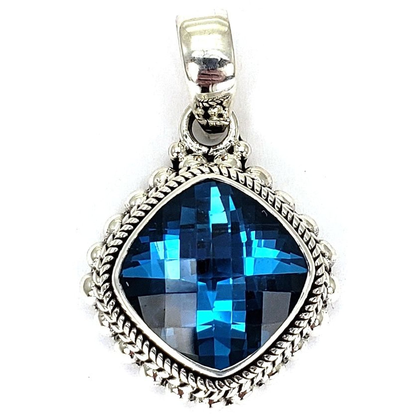 Sterling silver and Swiss blue topaz pendant.