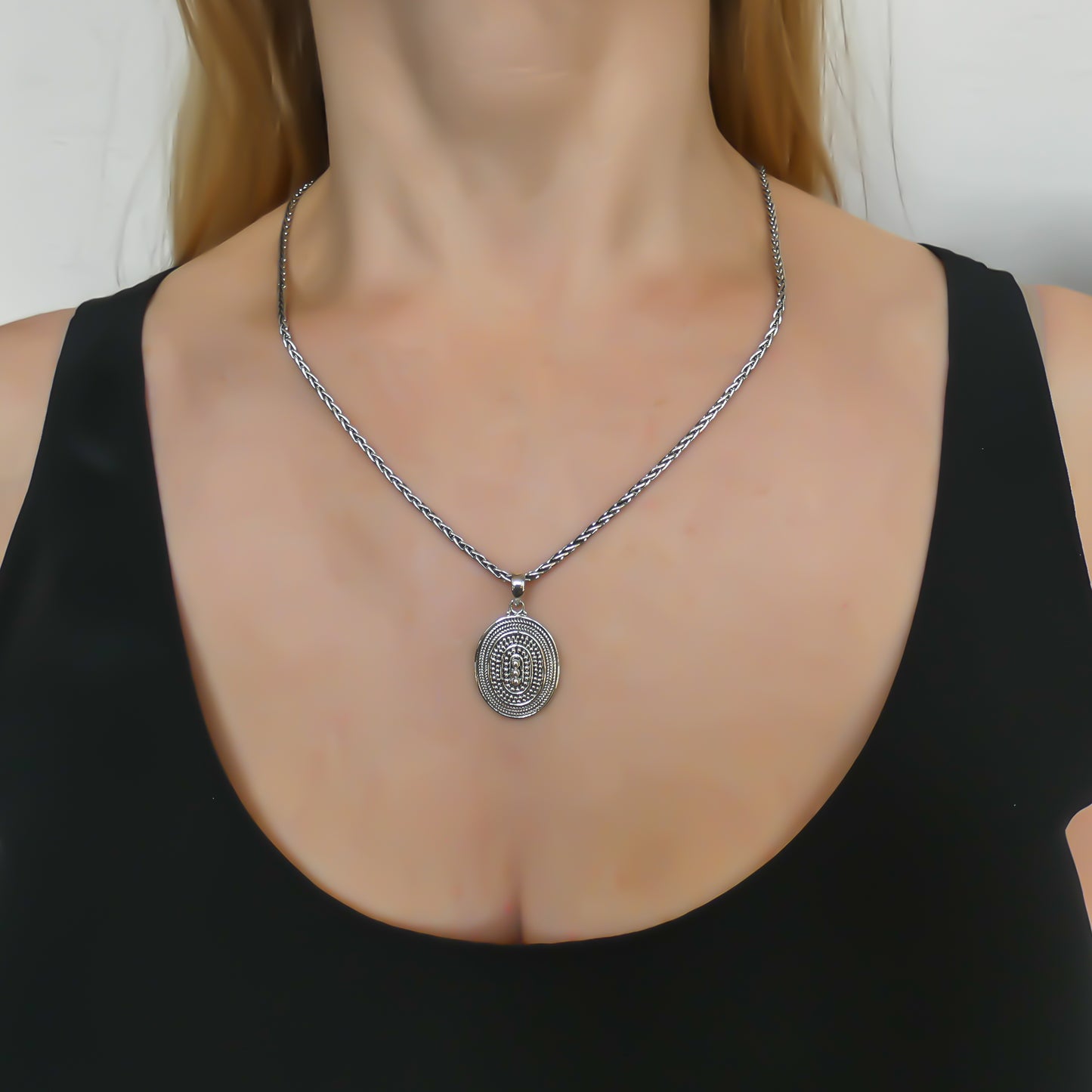 Sterling silver beaded pendant.