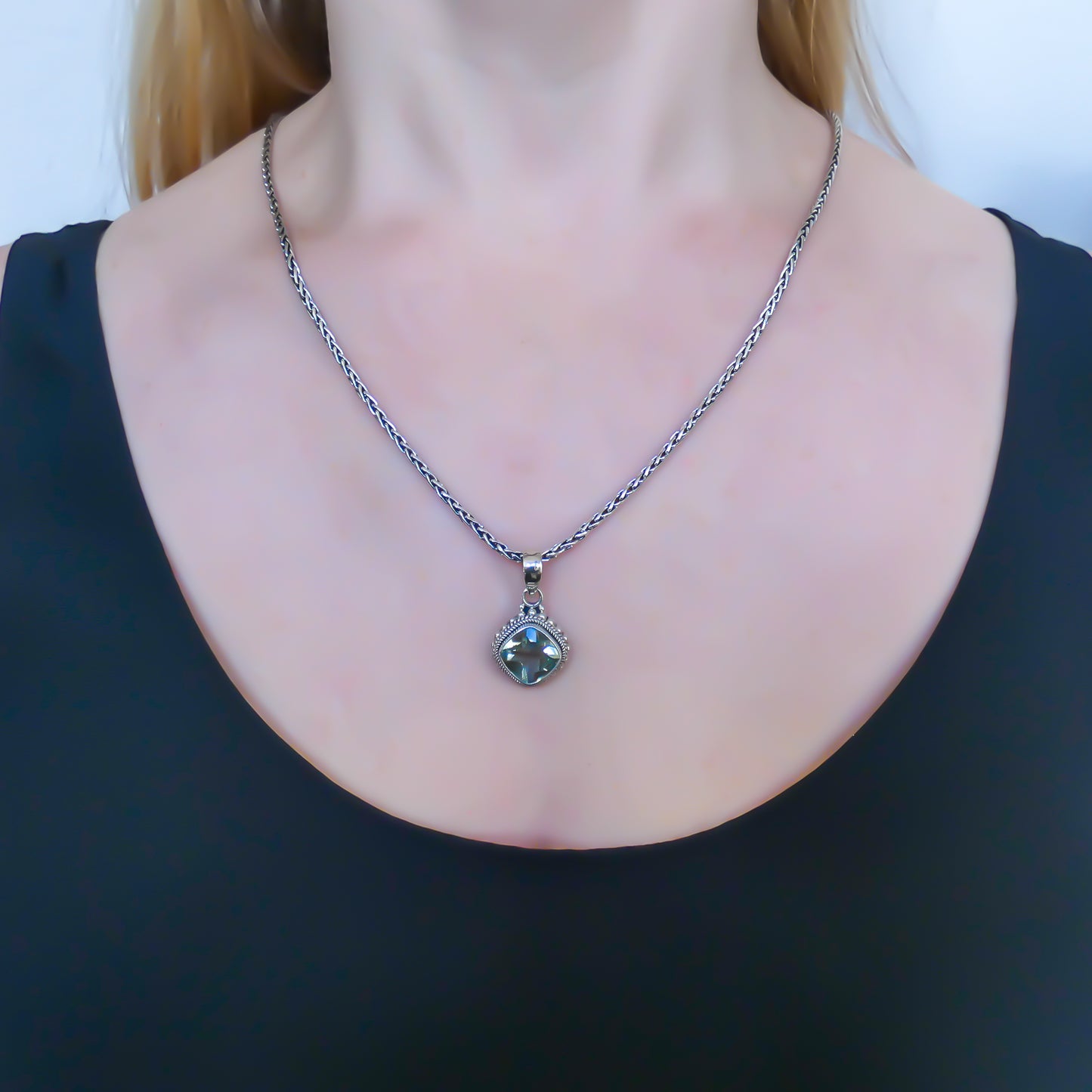 Sterling silver and green amethyst pendant.