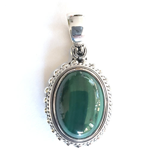 P034MA LIMITED .925 Sterling Silver Pendant with an Oval Malachite Stone