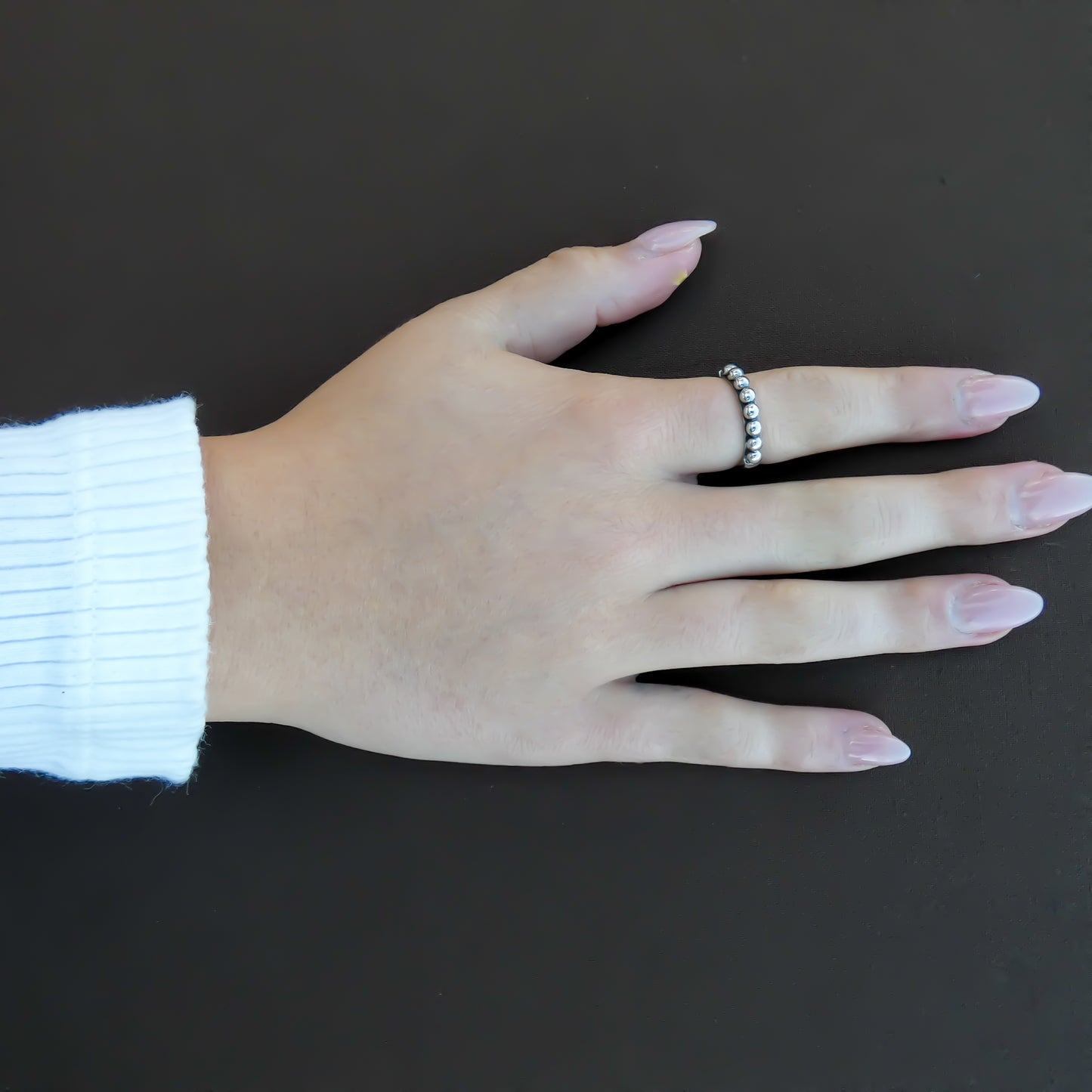 Sterling silver beaded ring.