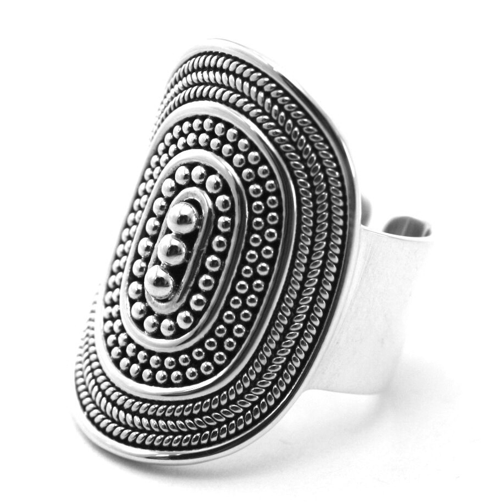 Sterling silver ring with handmade design motif.