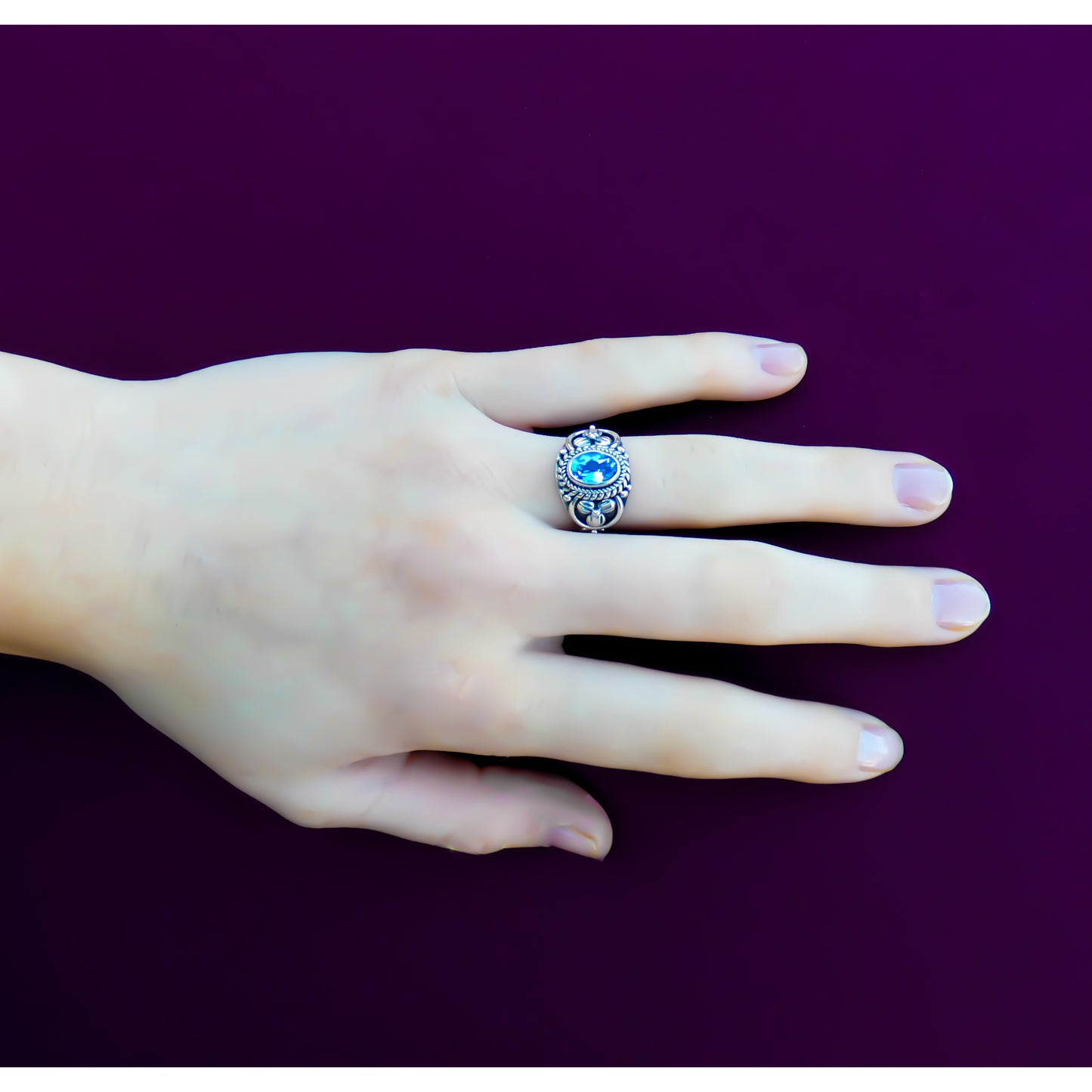 Sterling silver and blue topaz ring.