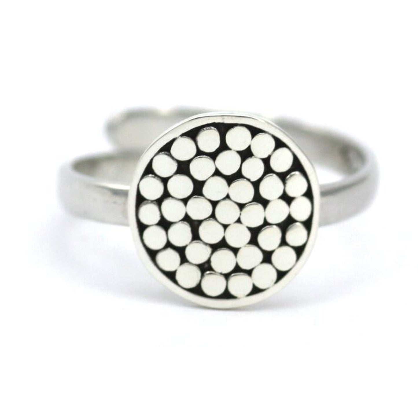 Sterling silver ring with center disc.