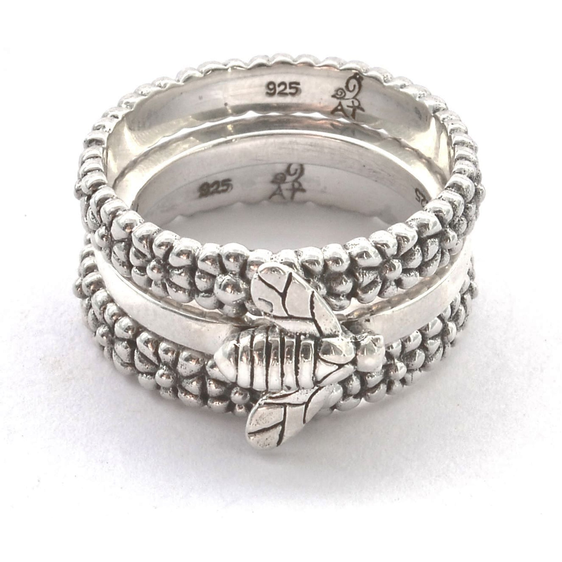 Sterling silver ring set with bee motif.