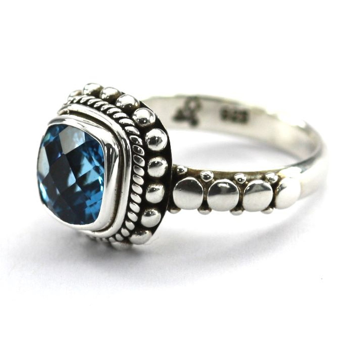 Sterling silver and blue topaz ring.