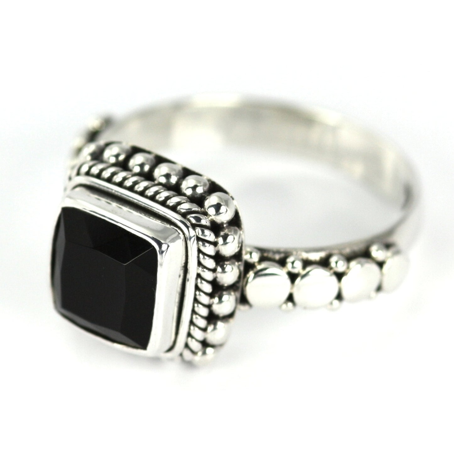 Sterling silver and faceted black onyx ring.