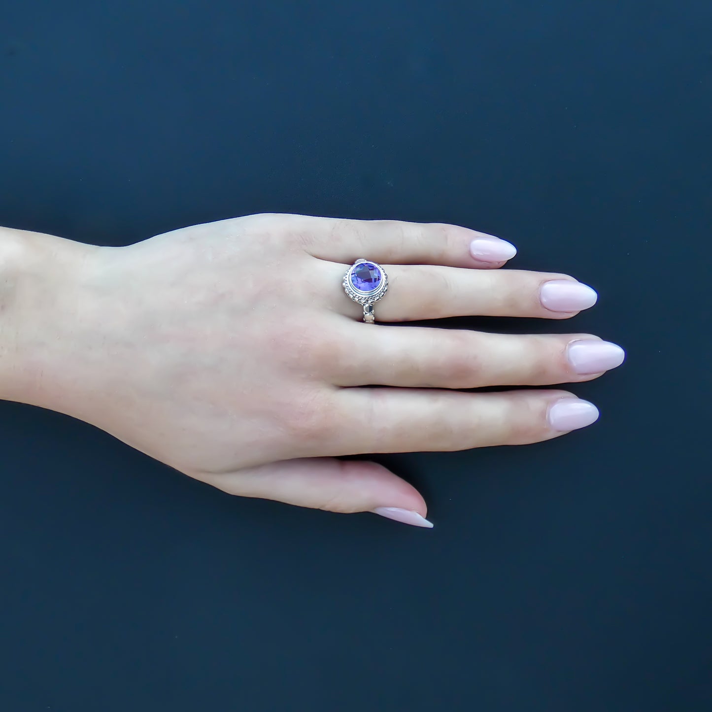 Sterling silver and round amethyst ring.
