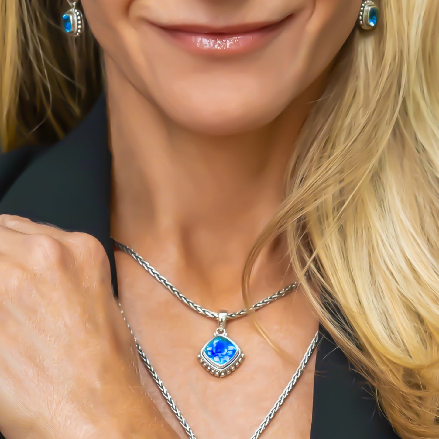 Sterling silver and Swiss blue topaz pendant.