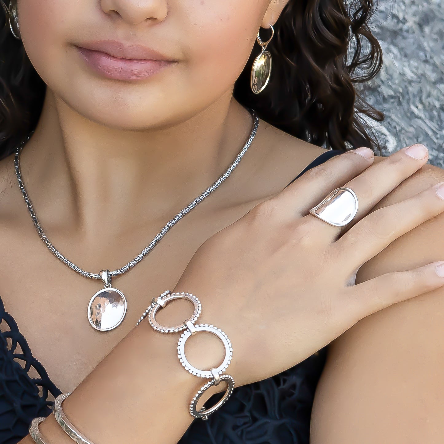 Sterling silver oval pendant.