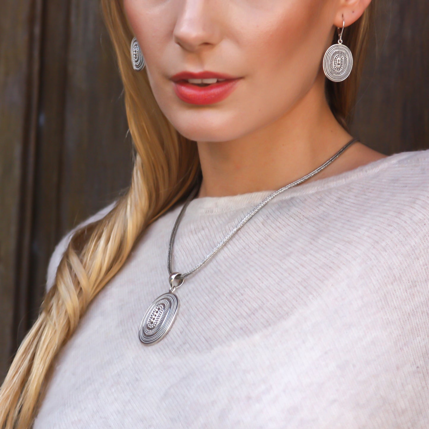 Sterling silver beaded pendant.