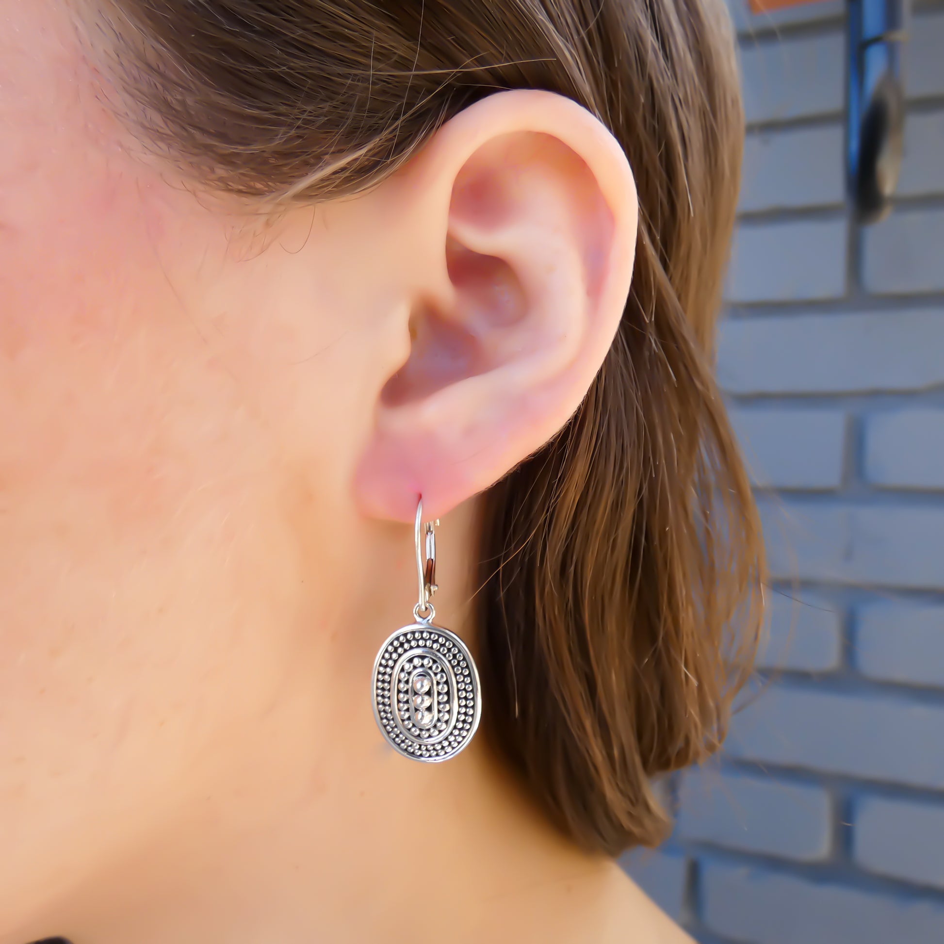Sterling silver oval earrings.