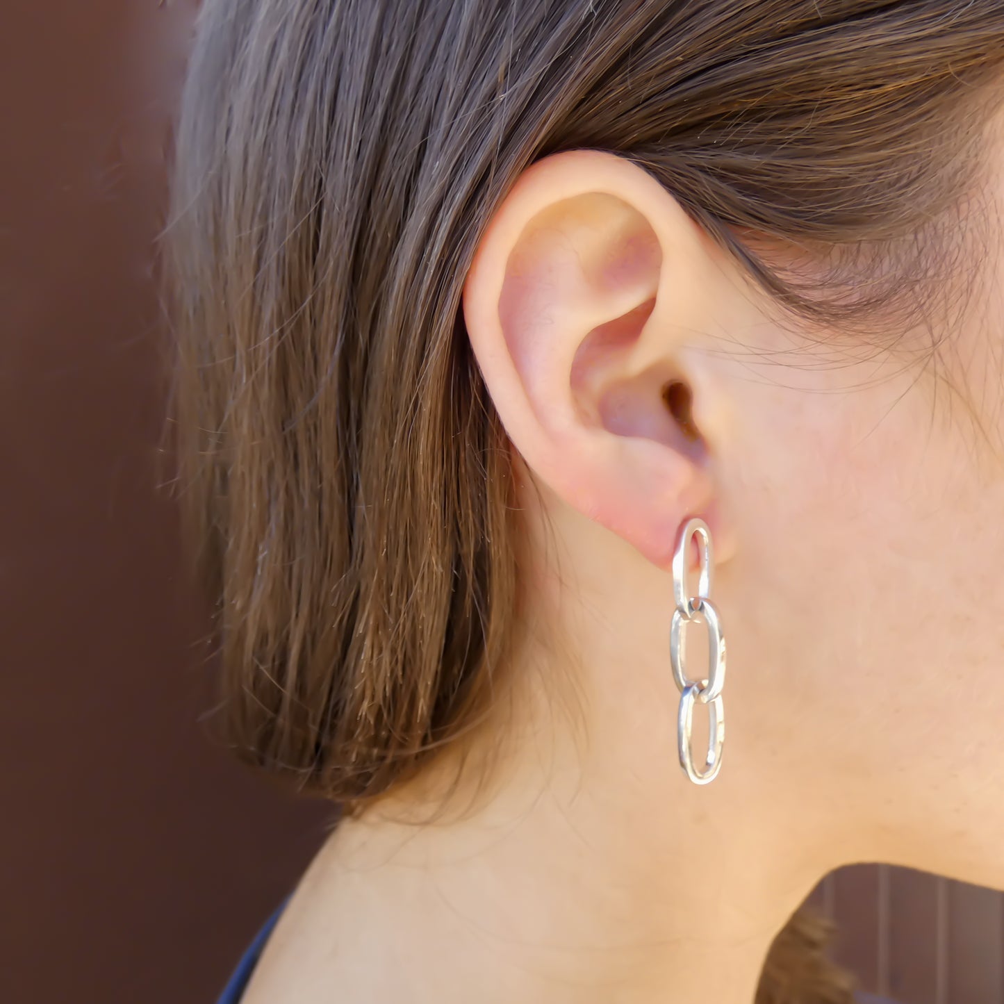 Sterling silver oval link earrings.