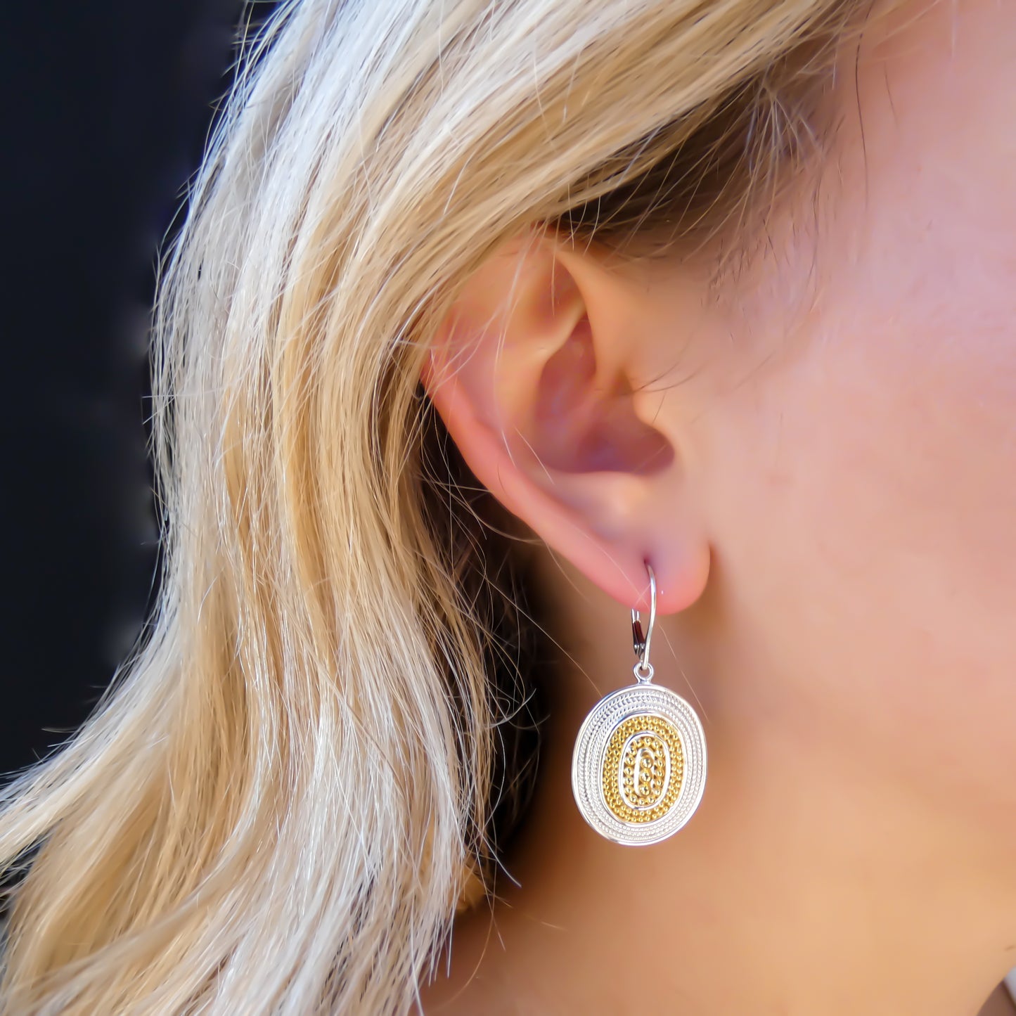 Sterling silver beaded earrings with gold.