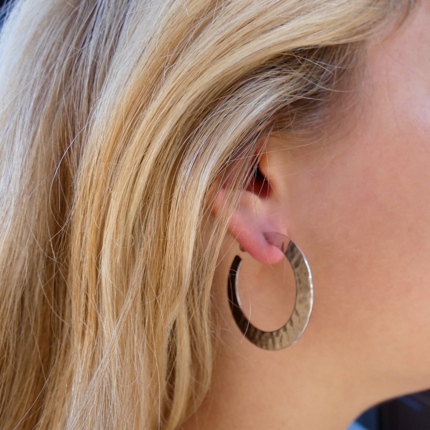 Sterling silver mirror dome earrings.