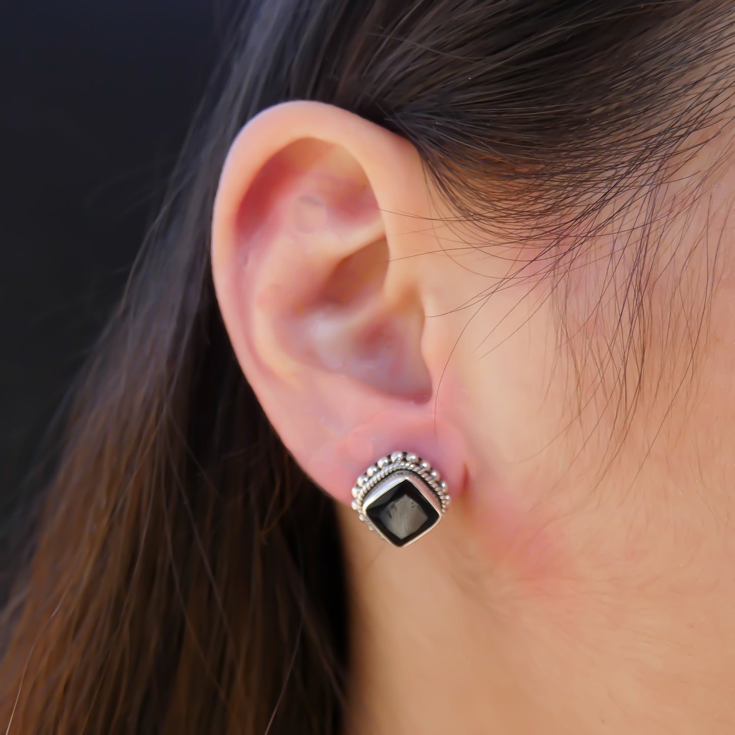 Sterling silver post earrings with faceted black onyx.