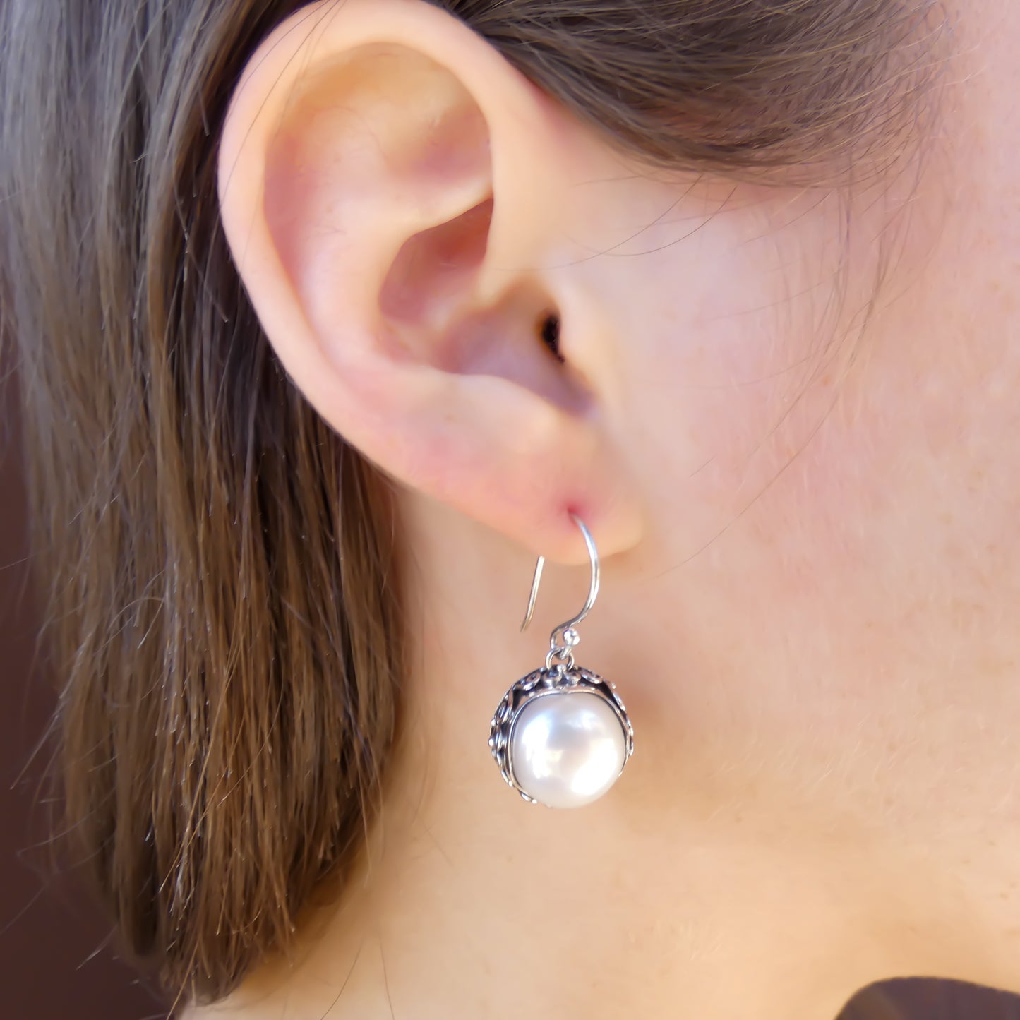 Sterling silver and pearl earrings.