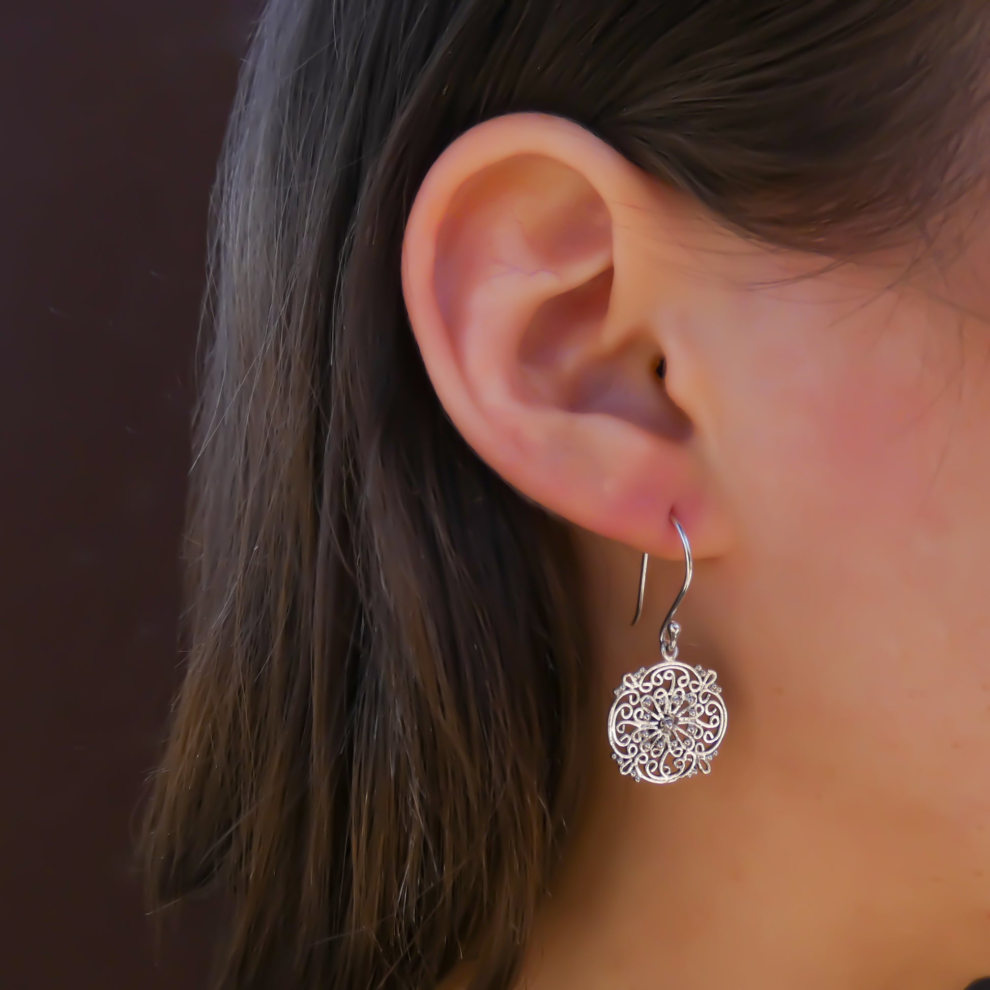 Sterling silver wire filigree round earrings.