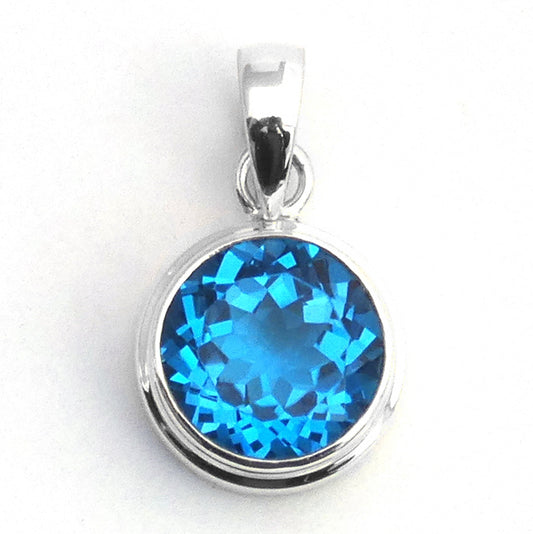 Sterling silver and Swiss blue topaz round pendant.