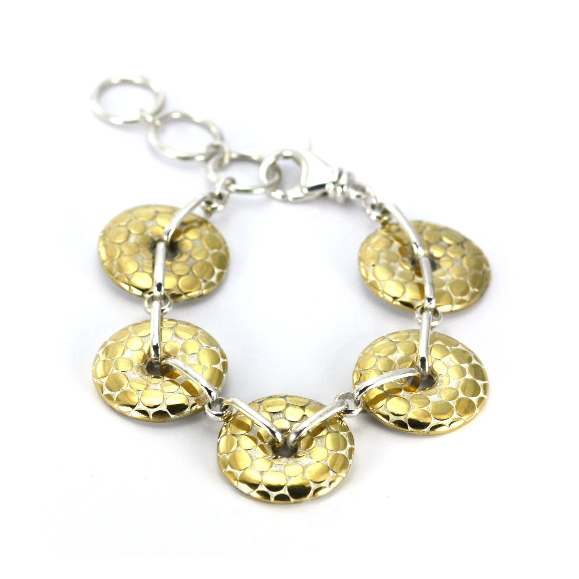 Sterling silver and gold bracelet.