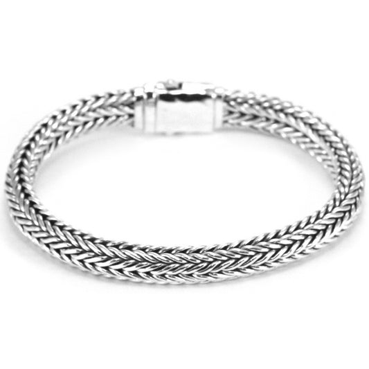 Large silver nine inch snake chain bracelet with a hammered barrel clasp.