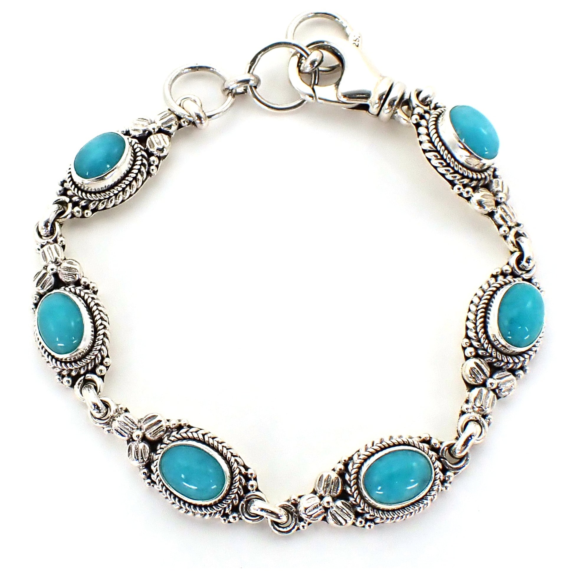 Silver bracelet with six links holding blue cabochon amazonite stones and floral accents.