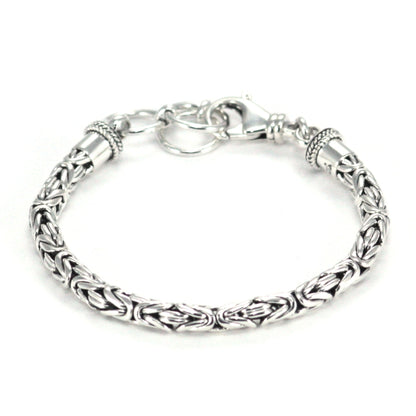 Thick silver byzantine chain bracelet with lobster clasp.