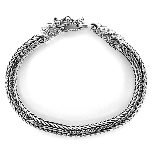 Sterling silver chain bracelet with dragon clasp.