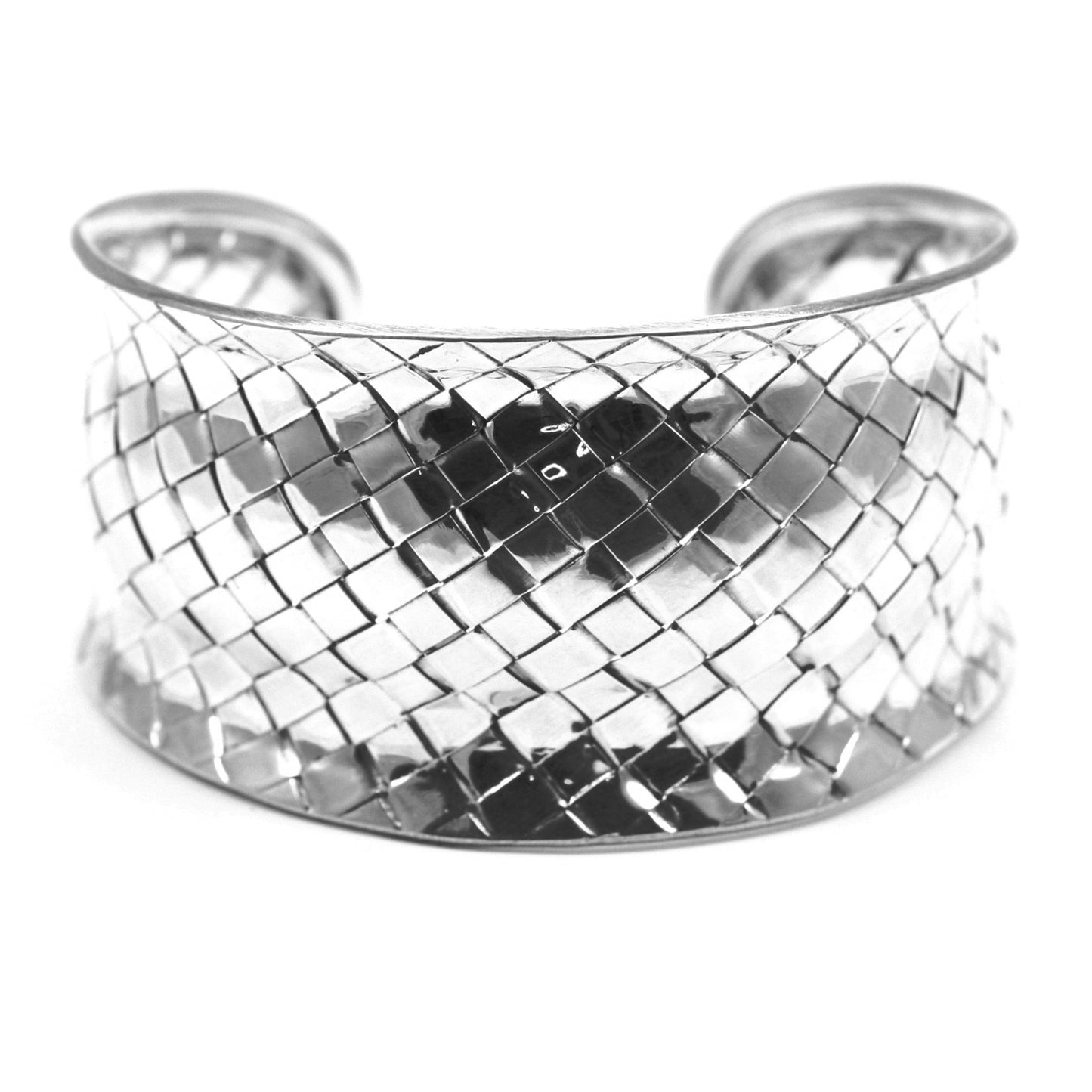 Woven silver cuff bracelet with multiple curves.